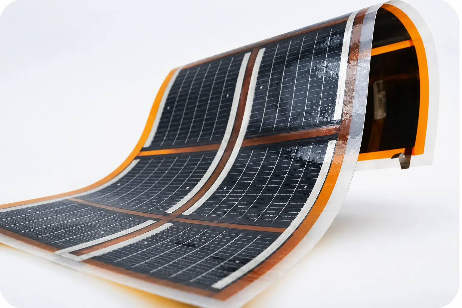Flexible thin-film photovoltaic laminate of the kind integrated across the tower exterior